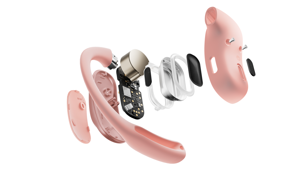 Pink Shokz OpenFit Air earbud taken apart into its internal components