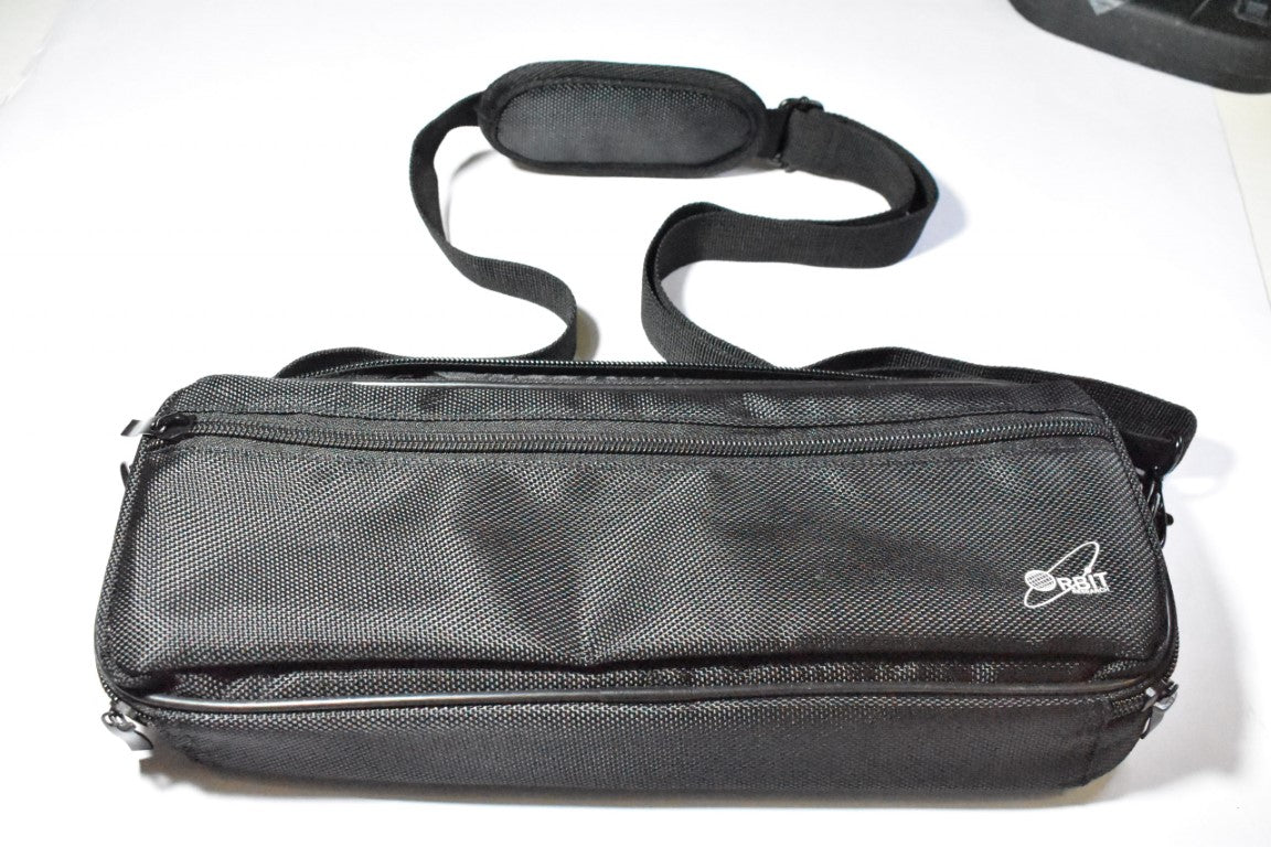 The black Orbit Reader 40 Fitted Leather carrying case with an adjustable, padded shoulder strap. It is rectangular and is made of a textured fabric material. There is a small white Orbit Research logo on the bottom right corner of the case.