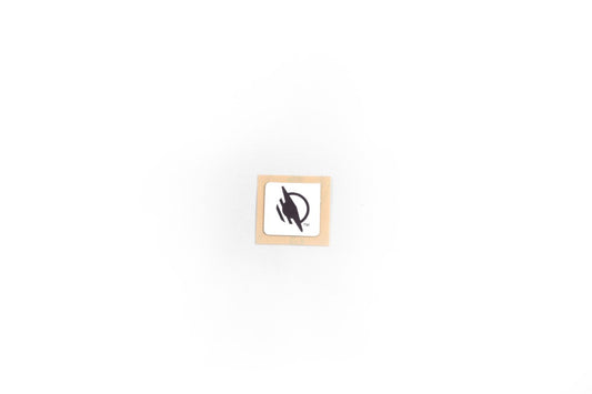 Square/rectangular metal WayTag sticker with rounded corners. The sticker features a light beige background, with the WayAround logo in the center.