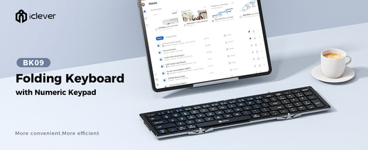 An angled top-down view of the iClever BK09 Bluetooth Folding Keyboard. The keyboard is folded open, showing its full QWERTY layout with a dedicated numeric keypad on the right side.