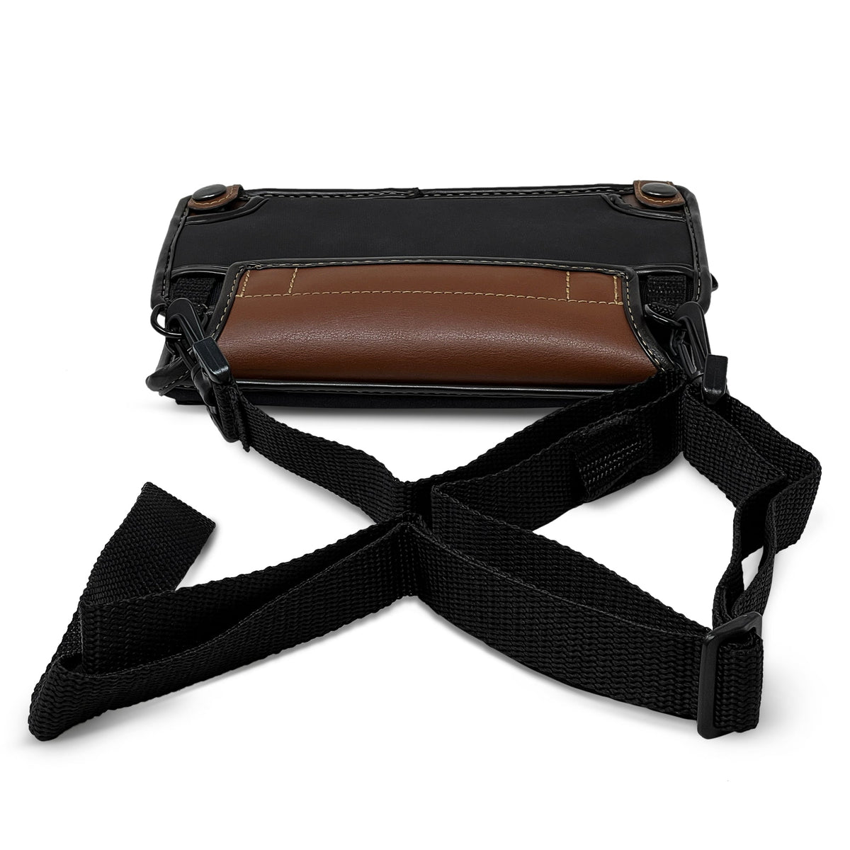 Back of the saddle-brown Brailliant BI 20X fitted case with detachable shoulder strap attached to two metal rings and brown leather carrying grip.