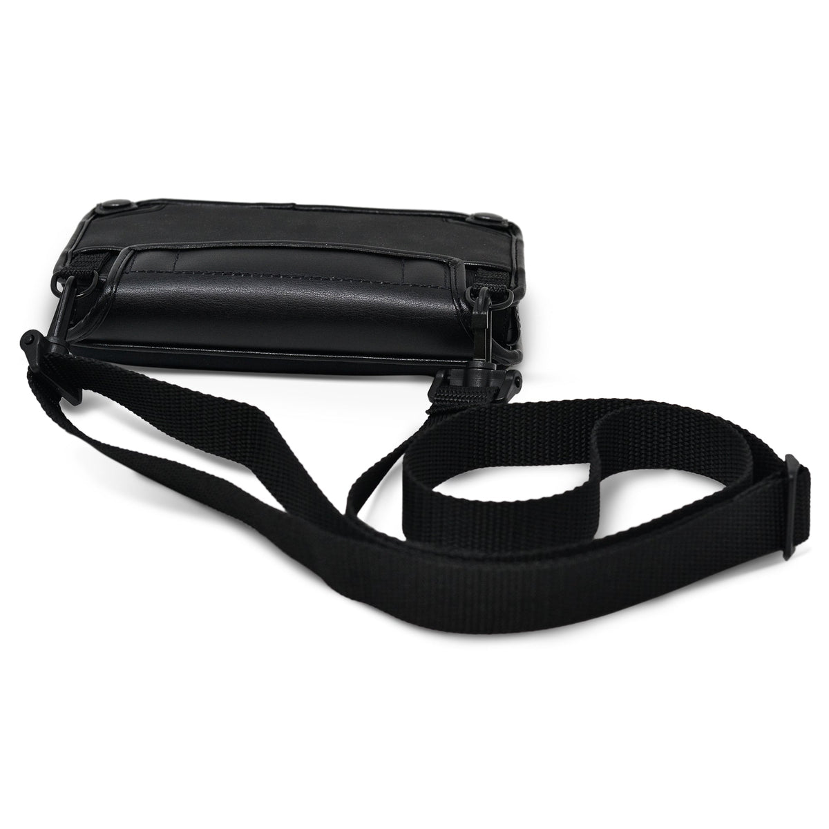 Brailliant BI 20X fitted case with the shoulder strap attached by clips to the side rings, displayed lying behind the case.