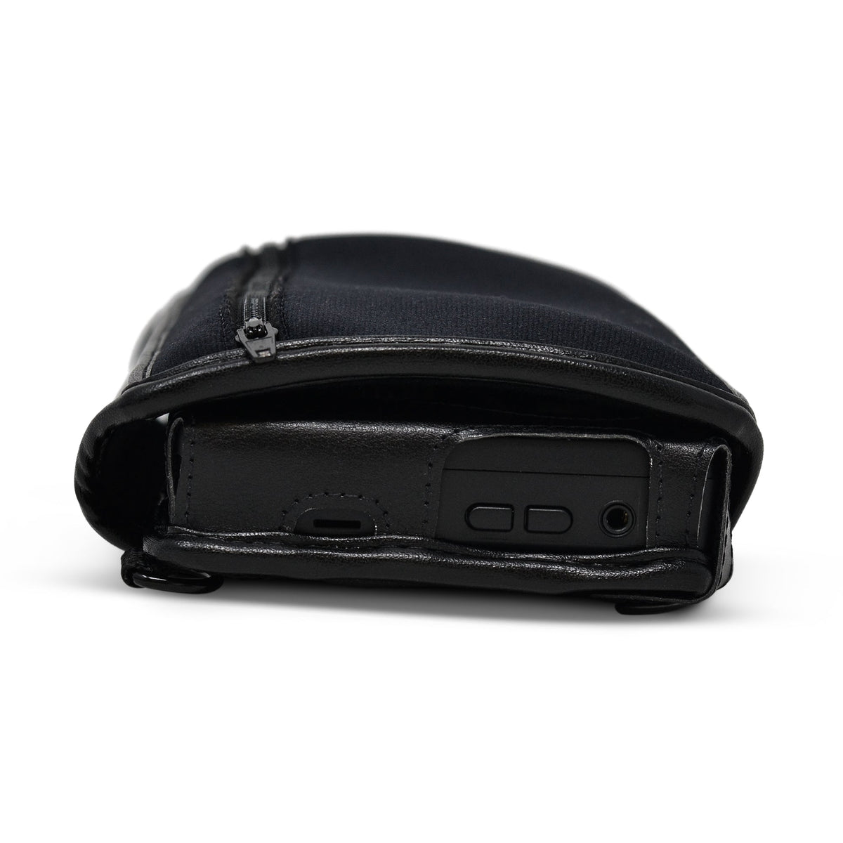 Side view of the Brailliant BI 20X case, showing the protective zippered flap above exposed device controls and the headphone socket.