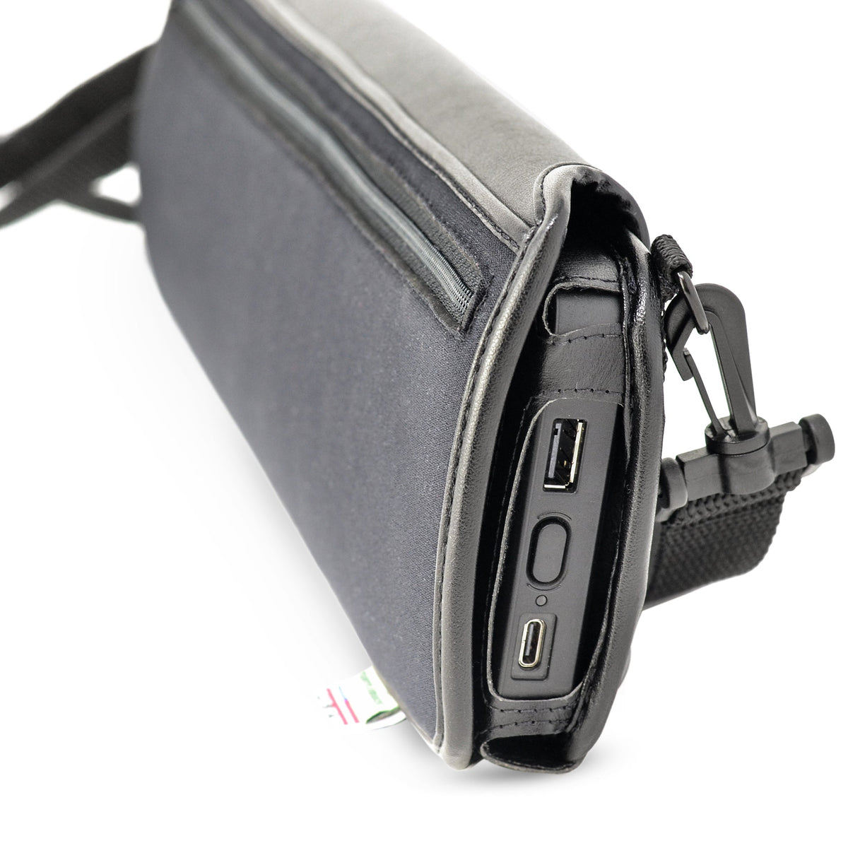 Close-up of the Brailliant BI 40X case's side USB-A and USB-C ports accessible next to the carrying strap clip.
