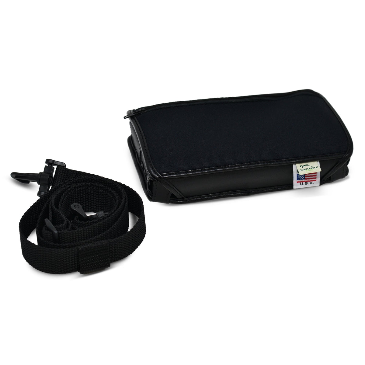 Closed Brailliant BI 20X case angled beside its rolled adjustable shoulder strap, showing the zippered pocket and Turtleback USA label.