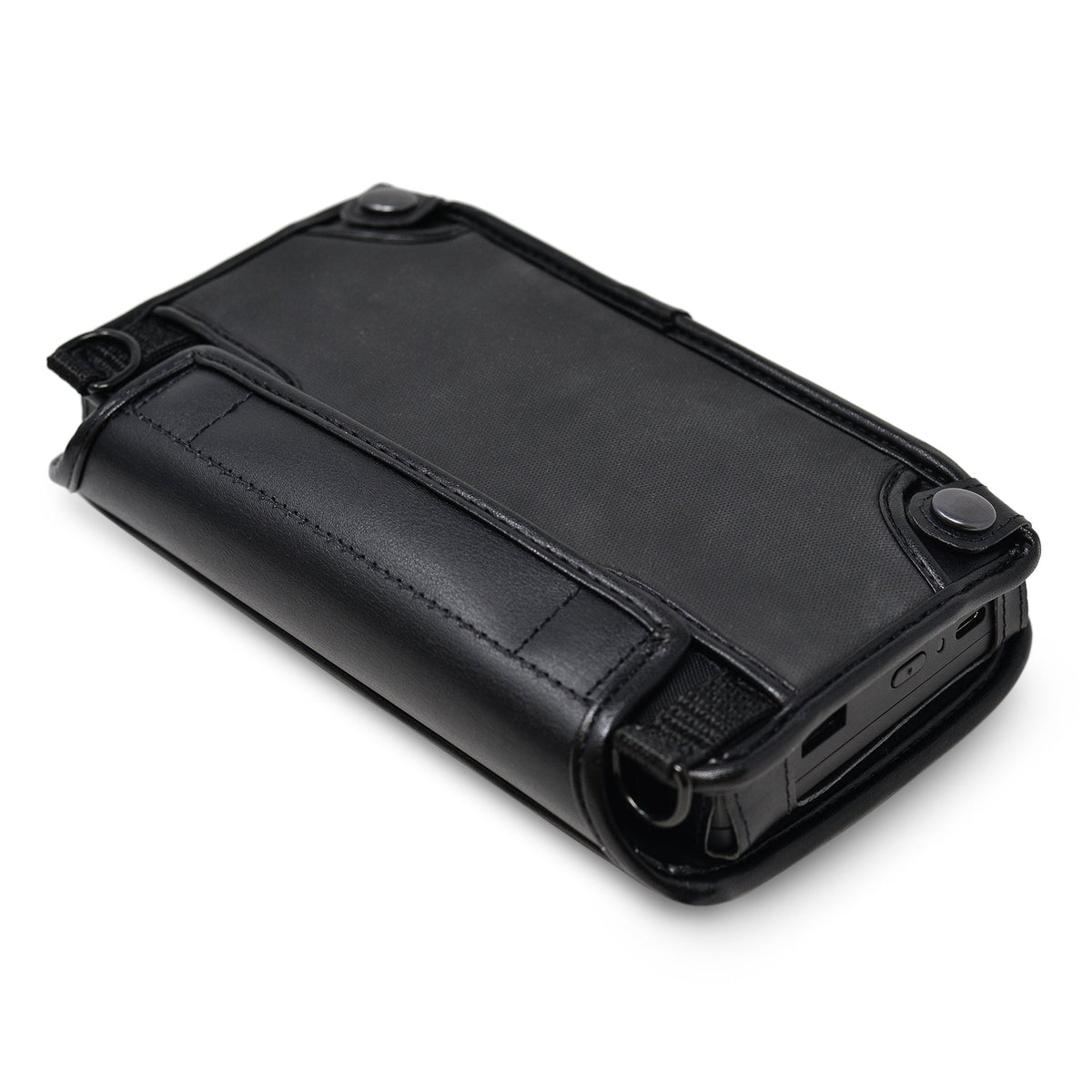 Angled rear view of the Brailliant BI 20X black fitted case showing the snap-fastened back panel and side control cutouts.