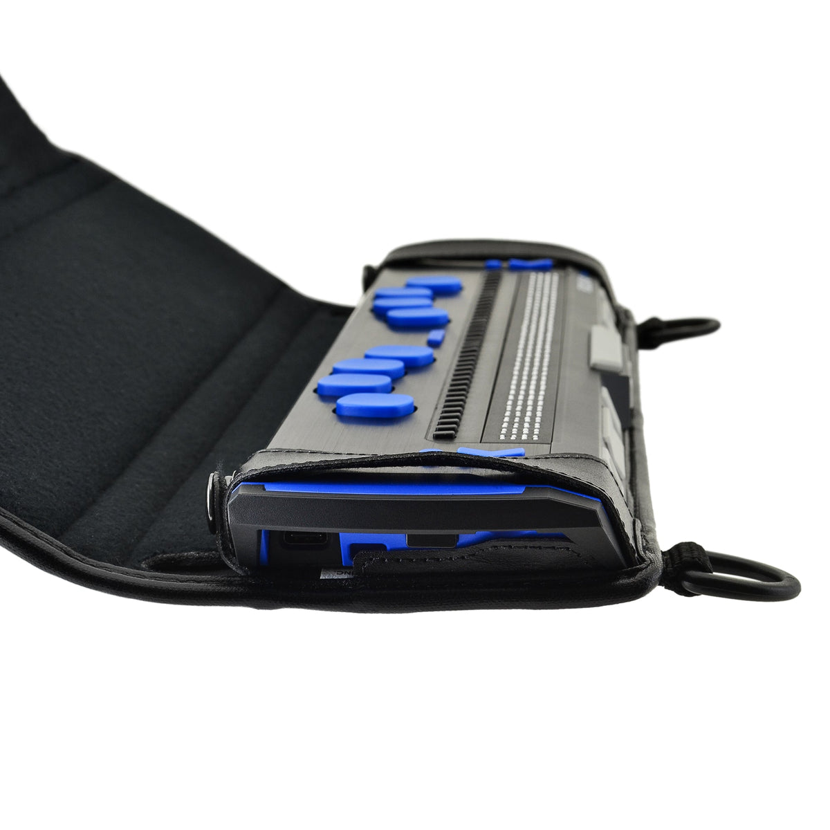 Close-up of one end of the Focus 40 Blue 5th Generation display in its case, with blue braille keys, protective leather corner and access opening.