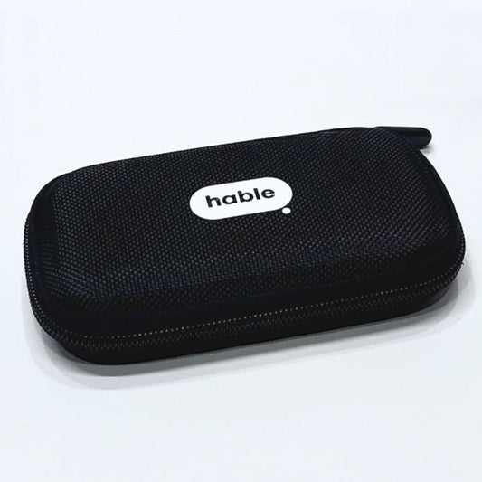 Closed black Hable Carry Case with a textured hard-shell exterior, zipper, and white Hable logo on top.