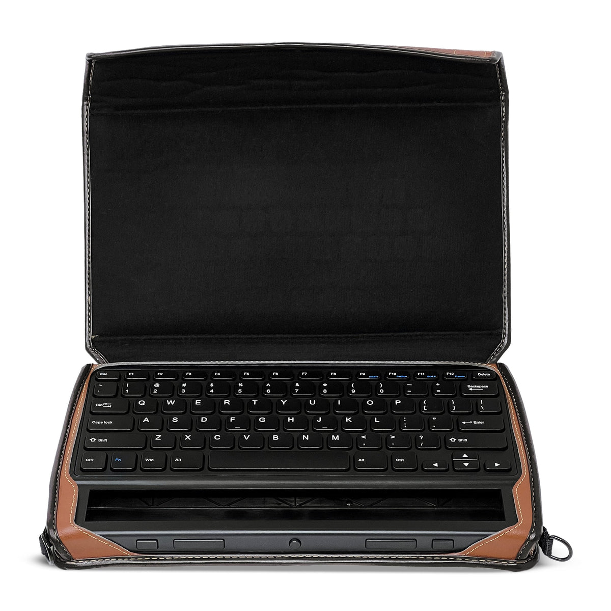 APH Mantis Q40 open inside its saddle-brown Turtleback case, with the keyboard, braille cells and keys accessible beneath the raised protective flap.