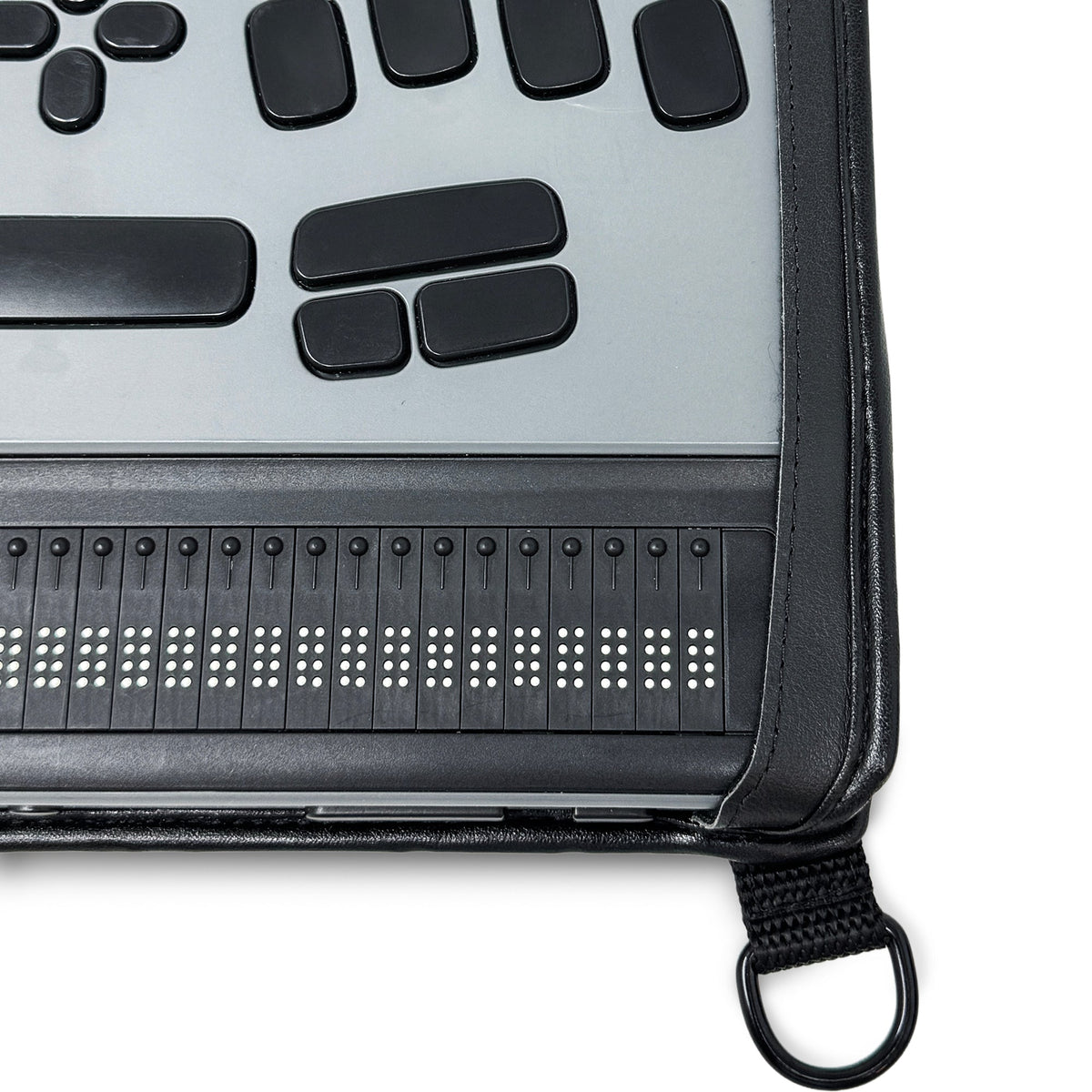 Close-up of BrailleNote Evolve braille cells and right-hand controls, with the leather case bordering the display and a strap ring below.