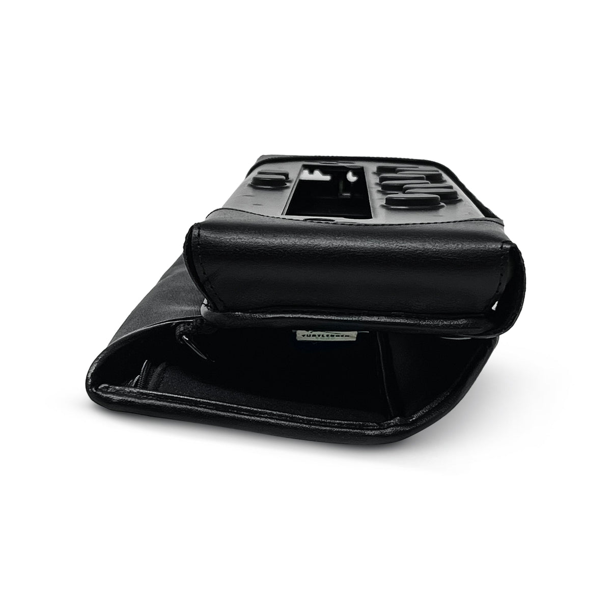 Other end of the bNote40 case, showing rounded protective leather corner and folded cover below exposed braille controls.