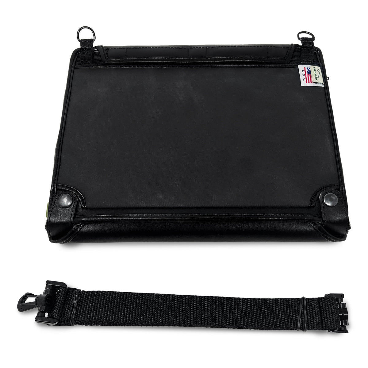 Back of the bBook32 case with leather carrying grip, two metal rings and the separate adjustable shoulder strap with plastic clips.