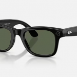 Three-quarter front view of the black_green Meta Ray Ban Smart Glasses. One arm is extended to the side, and the Ray‑Ban logo is visible on the temple against a light background.