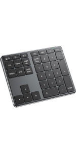 "Image of the iClever KP10 Bluetooth Wireless Number Pad. The compact, rectangular device features a sleek black design with 34 keys, including a standard numeric keypad and additional function keys like 'Esc,' 'Tab,' and 'Delete.' The keys have a slightly concave surface for comfortable typing and are arranged in a clear and intuitive layout. The casing is made of a durable aluminum alloy with a brushed finish, enhancing its modern and professional appearance. A small LED indicator light is visible at the 